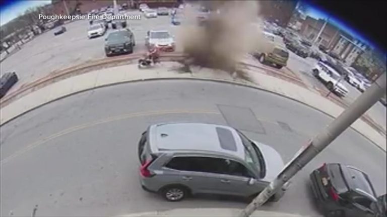 WATCH:  Video shows grandmother and kids narrowly miss exploding manhole