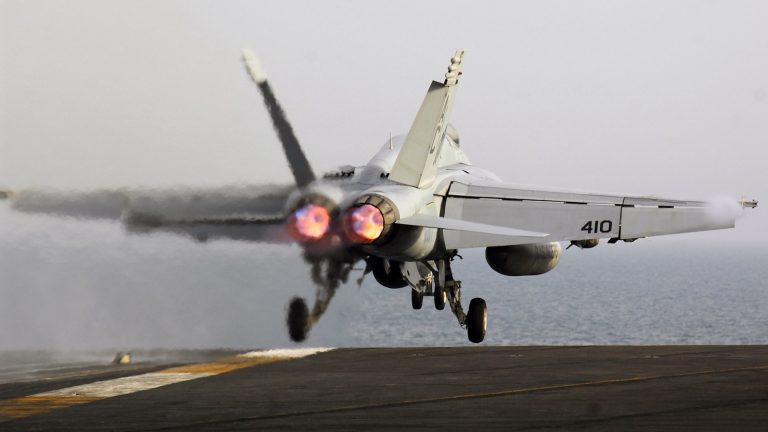 US fighter jet rolls off aircraft carrier, sinks into ocean, Navy says