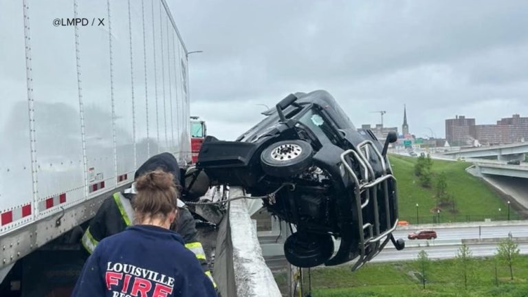 WATCH:  Louisville crash leads to dramatic rescue of a semi truck driver dangling off bridge